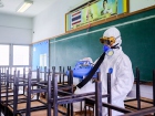 ดำเนินการพ่นน้ำยาฆ่าเชื้อและทำความสะอาดบริเวณรอบโรงเรียน Image 16